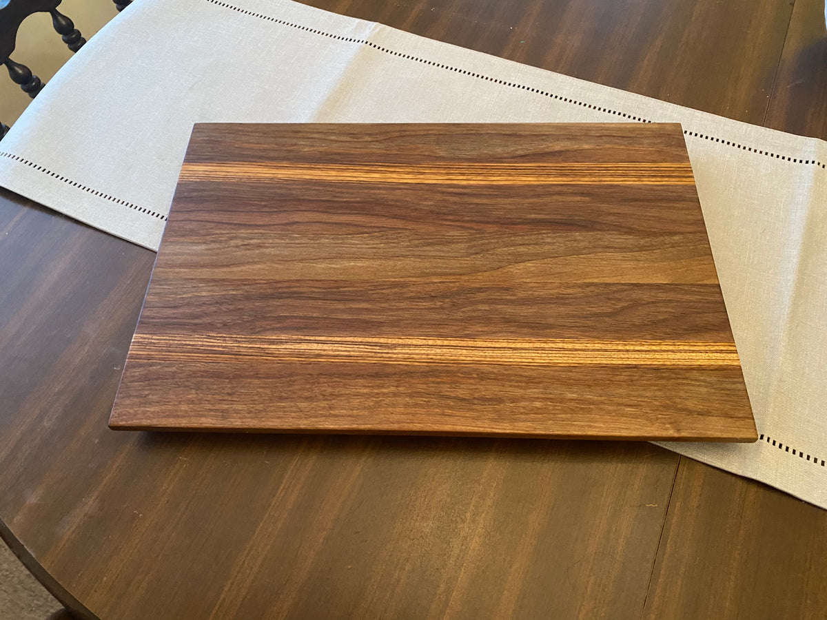 Walnut and Zebra wood cutting/charcuterie board Turnip Rock Woodworks